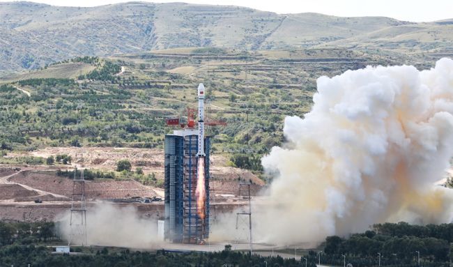 CHINESE ROCKET BOOSTER APPEARS TO CRASH NEAR SCHOOL DURING GAOFEN 11 SATELLITE LAUNCH