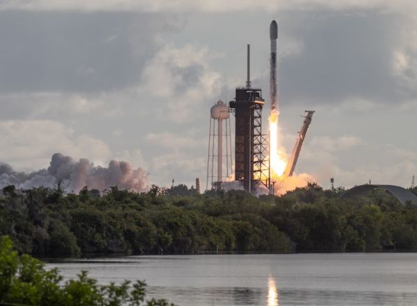 SPACEX ACES 500TH FALCON BOOSTER LANDING AMID SUNRISE STARLINK MISSION