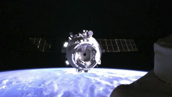 WATCH CHINA'S SHENZHOU 22 RESCUE SHIP ARRIVE AT TIANGONG SPACE STATION 