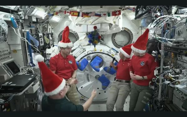 ASTRONAUTS BEAM HOME CHRISTMAS WISHES FROM INTERNATIONAL SPACE STATION: 'I THINK WE MAY BE ORBITING A LITTLE HIGHER THAN SANTA'