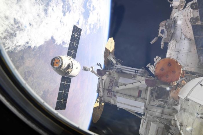 DRAGON CARGO CRAFT RETURNS TO EARTH