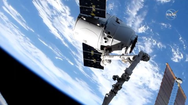 SPACEX CARGO SHIP REACHES SPACE STATION