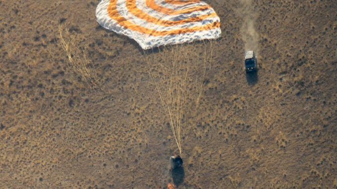 SOYUZ SPACECRAFT LANDS IN KAZAKHSTAN WITH THREE-MAN CREW