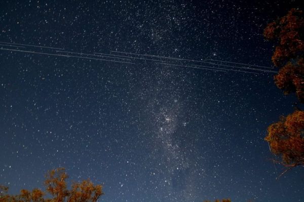 COMPOSITE IMAGE OF SPACEX STARLINK SATELLITE SWARM