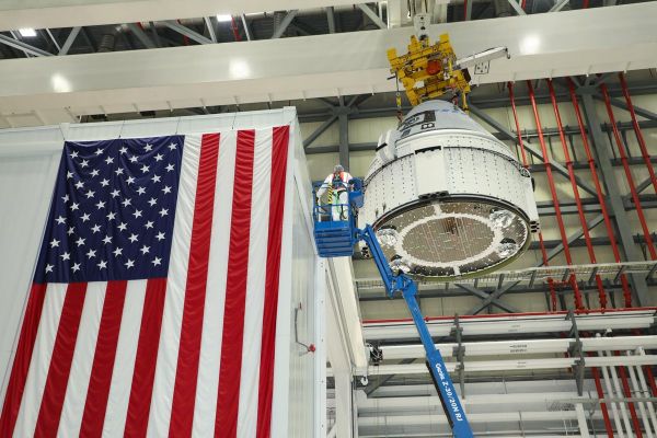 BOEING’S FIRST SPACE-READY STARLINER CREW CAPSULE HEADS TO ITS LAUNCH PAD THURSDAY