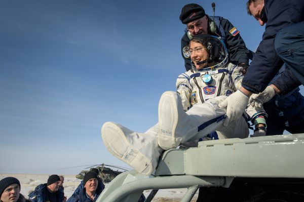 KOCH AND CREWMATES BACK ON EARTH