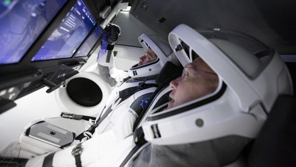 ASTRONAUTS TRAIN TO RIDE A DRAGON INTO SPACE