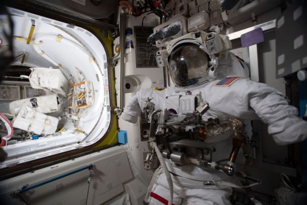 ASTRONAUTS COMPLETE SPACEWALK OUTSIDE SPACE STATION