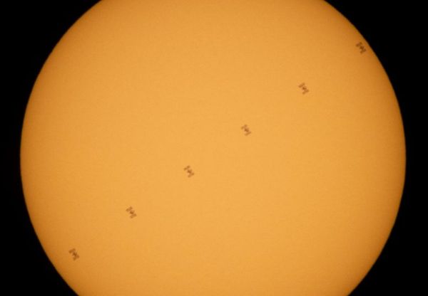 SPECTACULAR NEW IMAGES CAPTURE THE SPACE STATION CRUISE ACROSS THE SUN