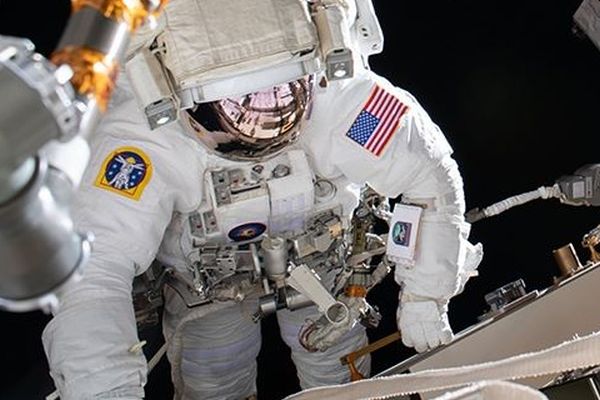 NASA SPACEWALKERS COMPLETE UPGRADE AT INT'L SPACE STATION