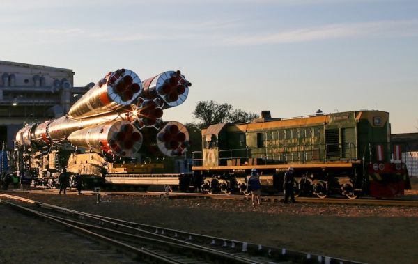 RUSSIAN ROCKET FOR NEXT SPACE STATION CREW TRANSFERRED TO LAUNCH PAD