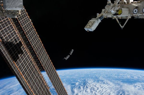 ASTRONAUTS SET TO LAUNCH SECURITY SATELLITE FROM SPACE STATION