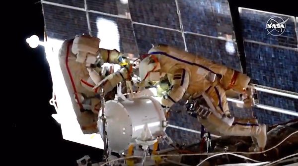 SPACEWALKERS PREP FOR ARRIVAL OF NEW RUSSIAN MODULE