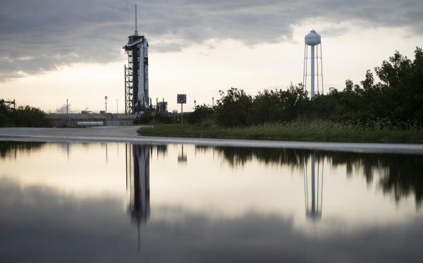 CREW DRAGON LAUNCH TO SPACE STATION DELAYED TO FRIDAY BY OFFSHORE WEATHER