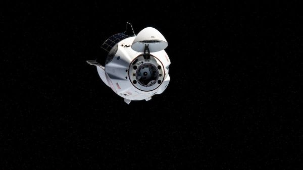 RETURN OF SPACEX CREW CAPSULE DELAYED BY HIGH WINDS