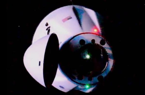 SPACEX DRAGON DOCKS AT SPACE STATION TO DELIVER NEW SOLAR ARRAYS AND TONS OF SUPPLIES