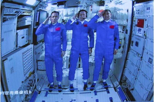 CREW STARTS MAKING CHINA'S NEW SPACE STATION THEIR HOME