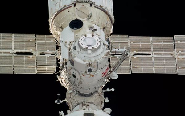 RUSSIA DELAYS DETACHING OLD SPACE STATION DOCKING PORT WHILE TESTING NEW RESEARCH MODULE IN ORBIT