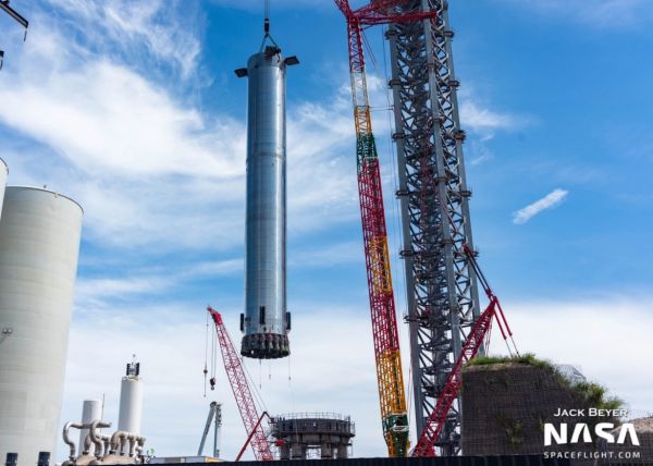 STARBASE SURGE SEES SPACEX SPEED AHEAD WITH BOOSTER 4 AND SHIP 20