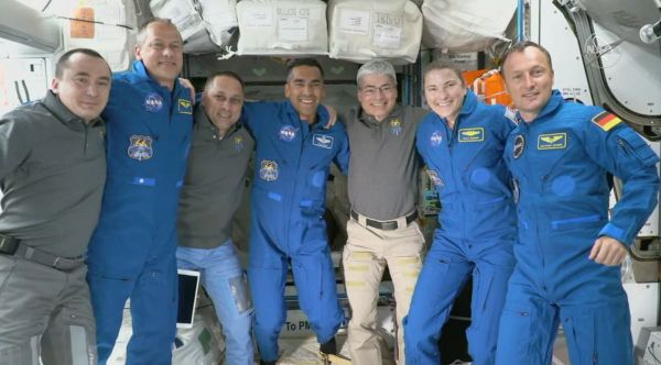 SPACEX CREW CAPSULE DOCKS AT INTERNATIONAL SPACE STATION