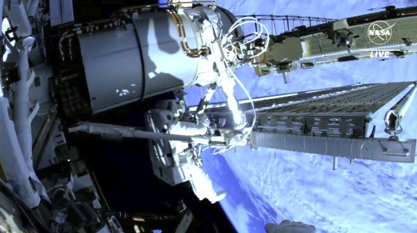 ASTRONAUTS UNFURL FOURTH ROLL-OUT SOLAR ARRAY OUTSIDE INTERNATIONAL SPACE STATION