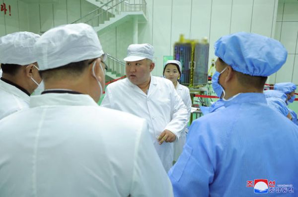 PHOTOS SHOW KIM JONG UN AND HIS DAUGHTER INSPECTING MILITARY SPY SATELLITE