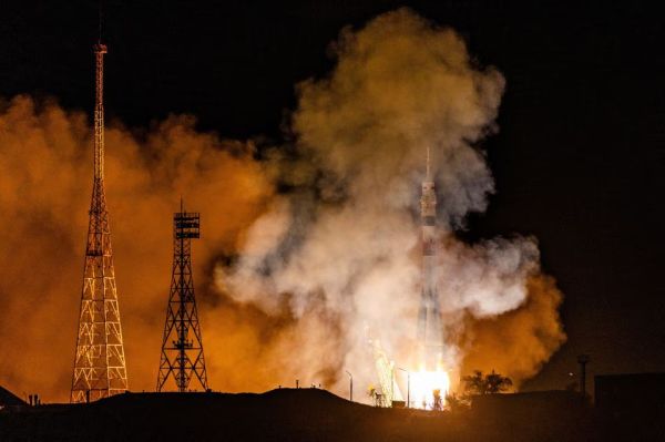 SOYUZ SPACECRAFT WITH US ASTRONAUT, TWO RUSSIAN COSMONAUTS DOCKS AT ISS