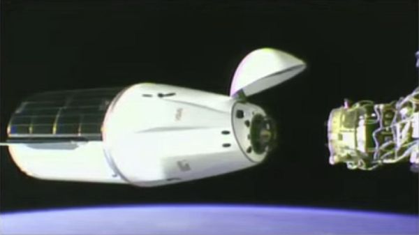 SPACEX DRAGON CARGO SHIP DOCKS AT ISS WITH LASER EXPERIMENT AND MORE
