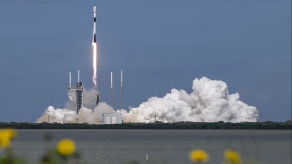 SPACEX ROCKET LAUNCHES 21 STARLINK SATELLITES INTO ORBIT, THEN LANDS AT SEA